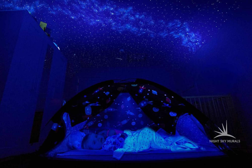 Kids camping under a Night Sky Mural