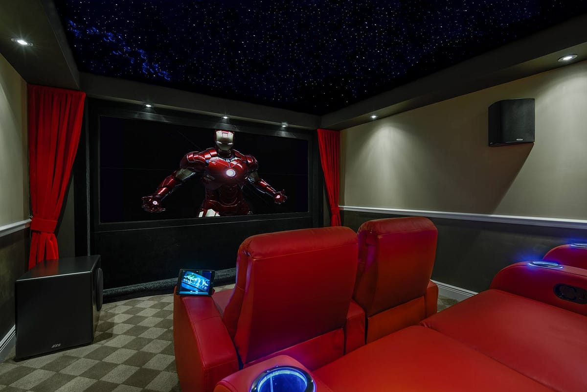 Rudy's Ironman theater star ceiling by Night Sky Murals